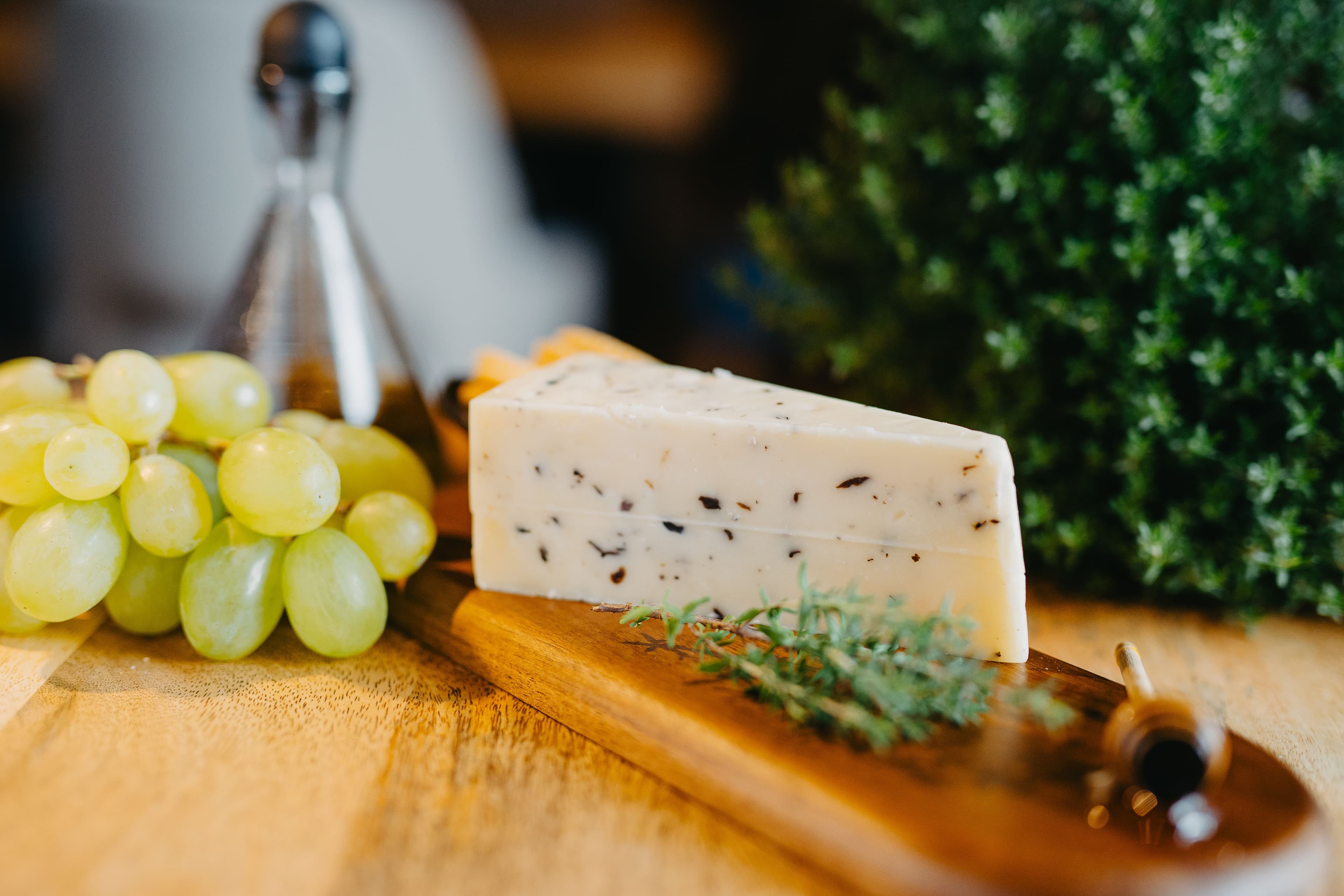 Matured artisanal cheeses on a board