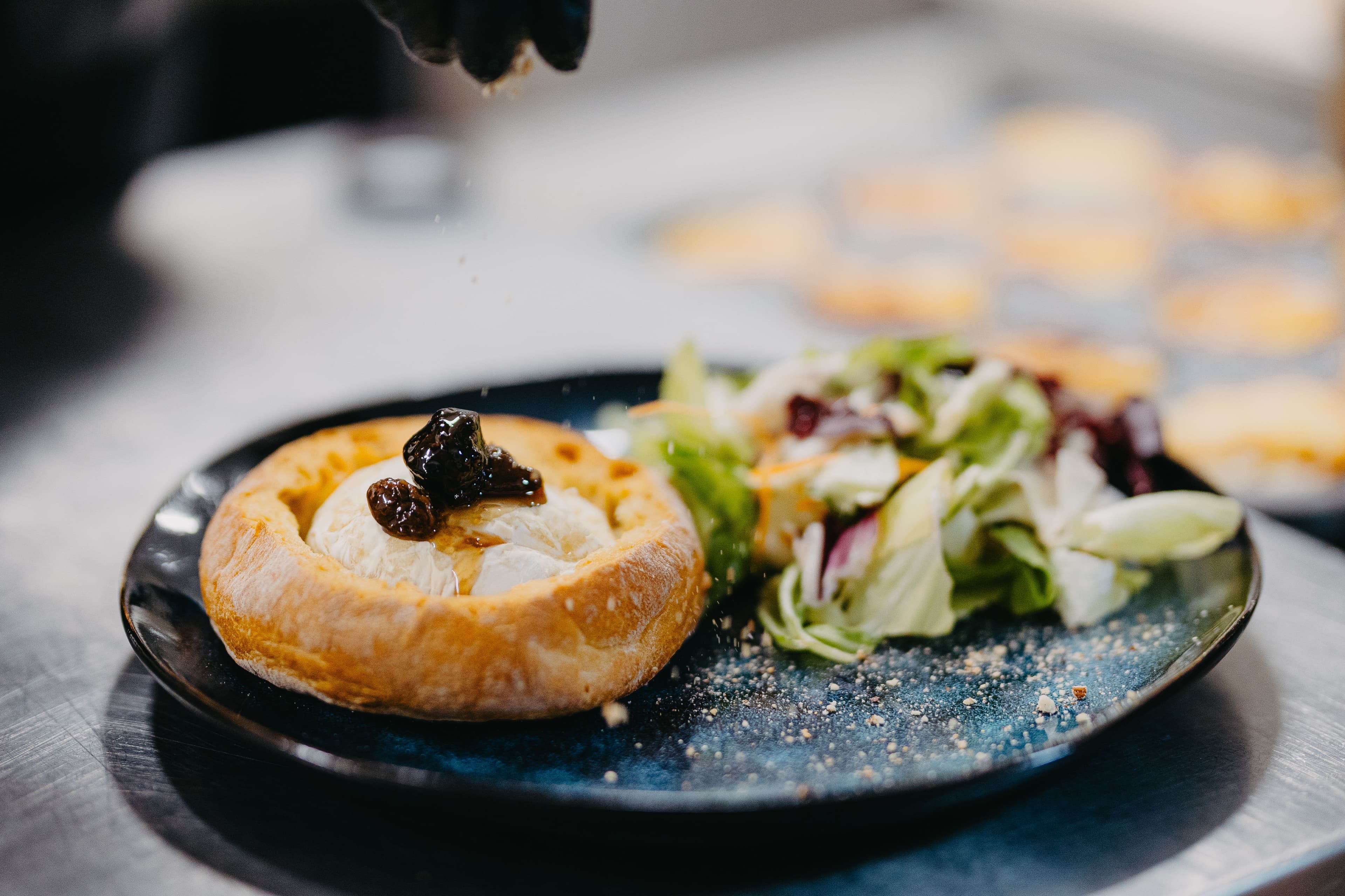 Traditional bell-roasted lamb served family-style